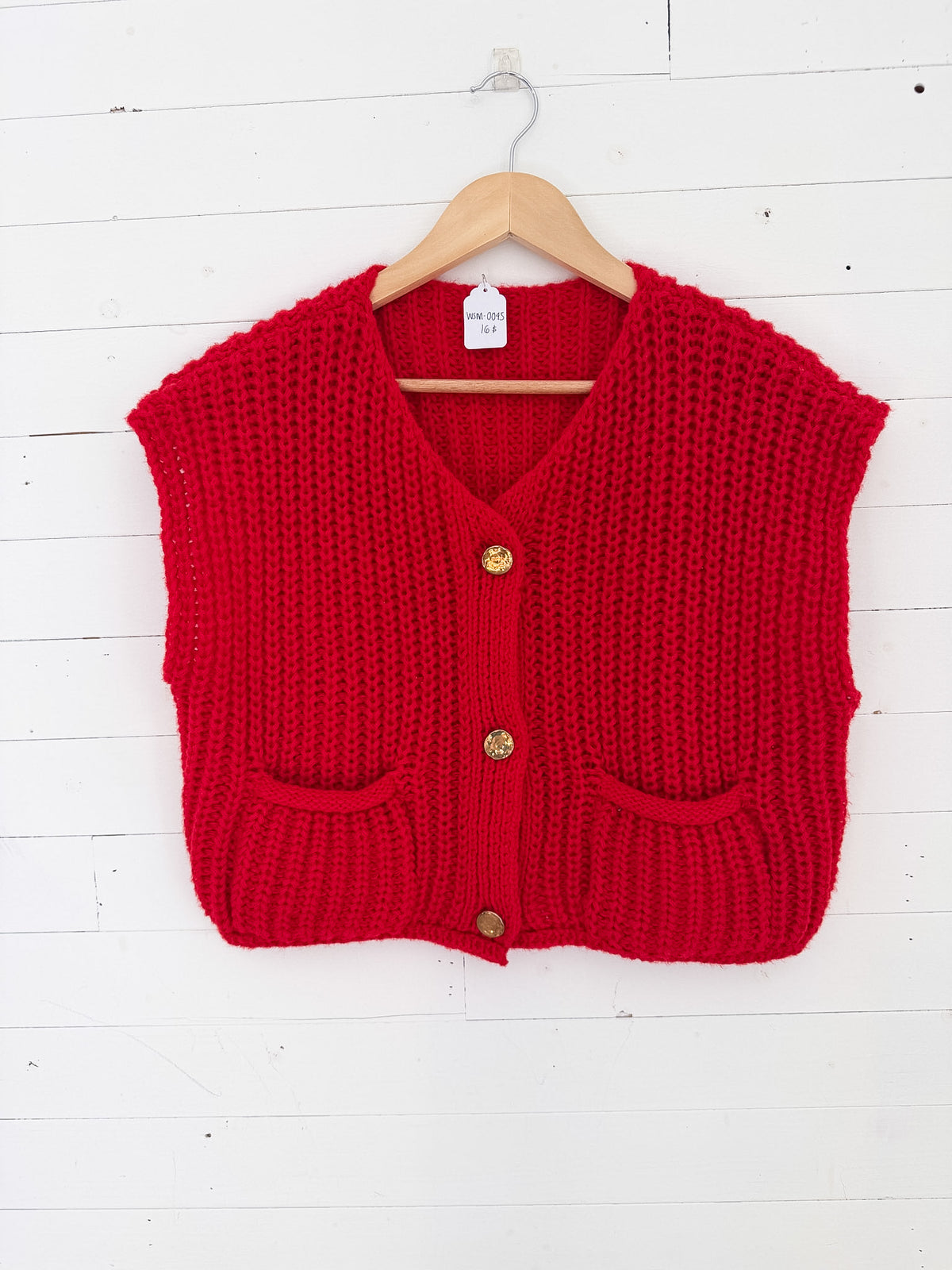 Tricot sans manches rouge à grosses mailles – seconde main