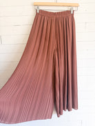 Pantalon ample en crêpe plissé Uniqlo – seconde main