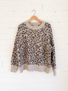 Chandail en tricot imprimé léopard crème et gris Old Navy – seconde main